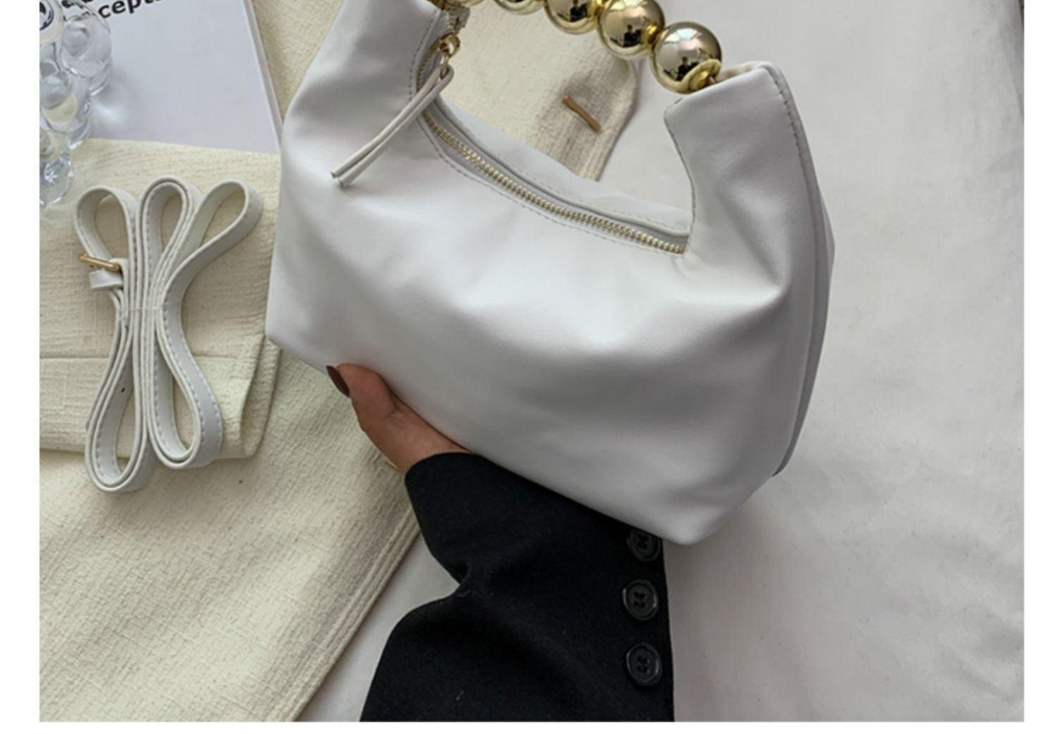 Bolso de mano con agarradero de perlas - bandolero