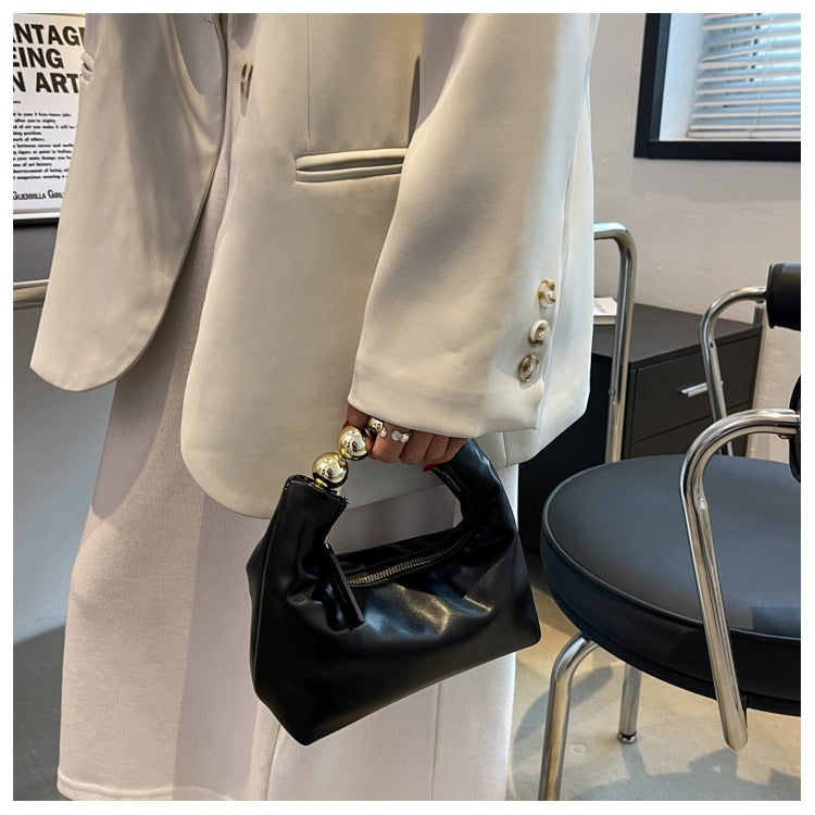 Bolso de mano con agarradero de perlas - bandolero