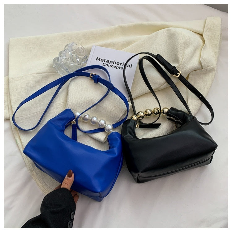 Bolso de mano con agarradero de perlas - bandolero