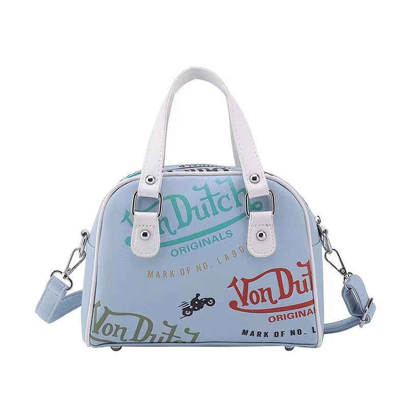 Bolso de mano y bandolera con grafiti Von Dutch