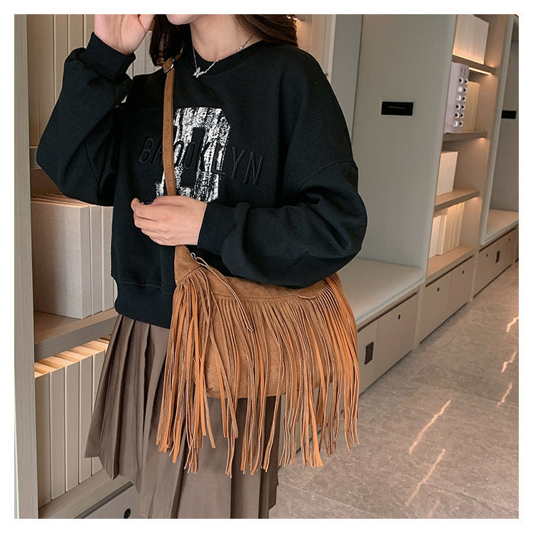 Bolso bandolera con flecos