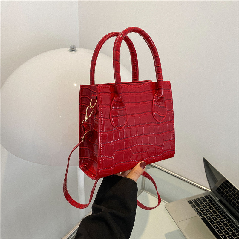 Bolso bandolera sencillo brillante efecto charol