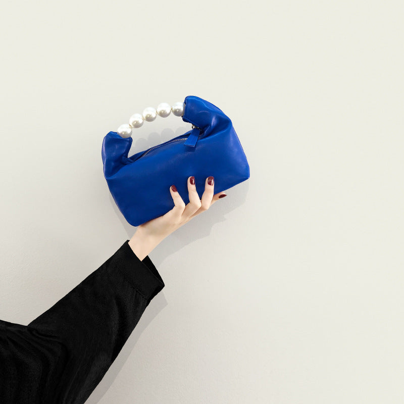 Bolso de mano con agarradero de perlas - bandolero
