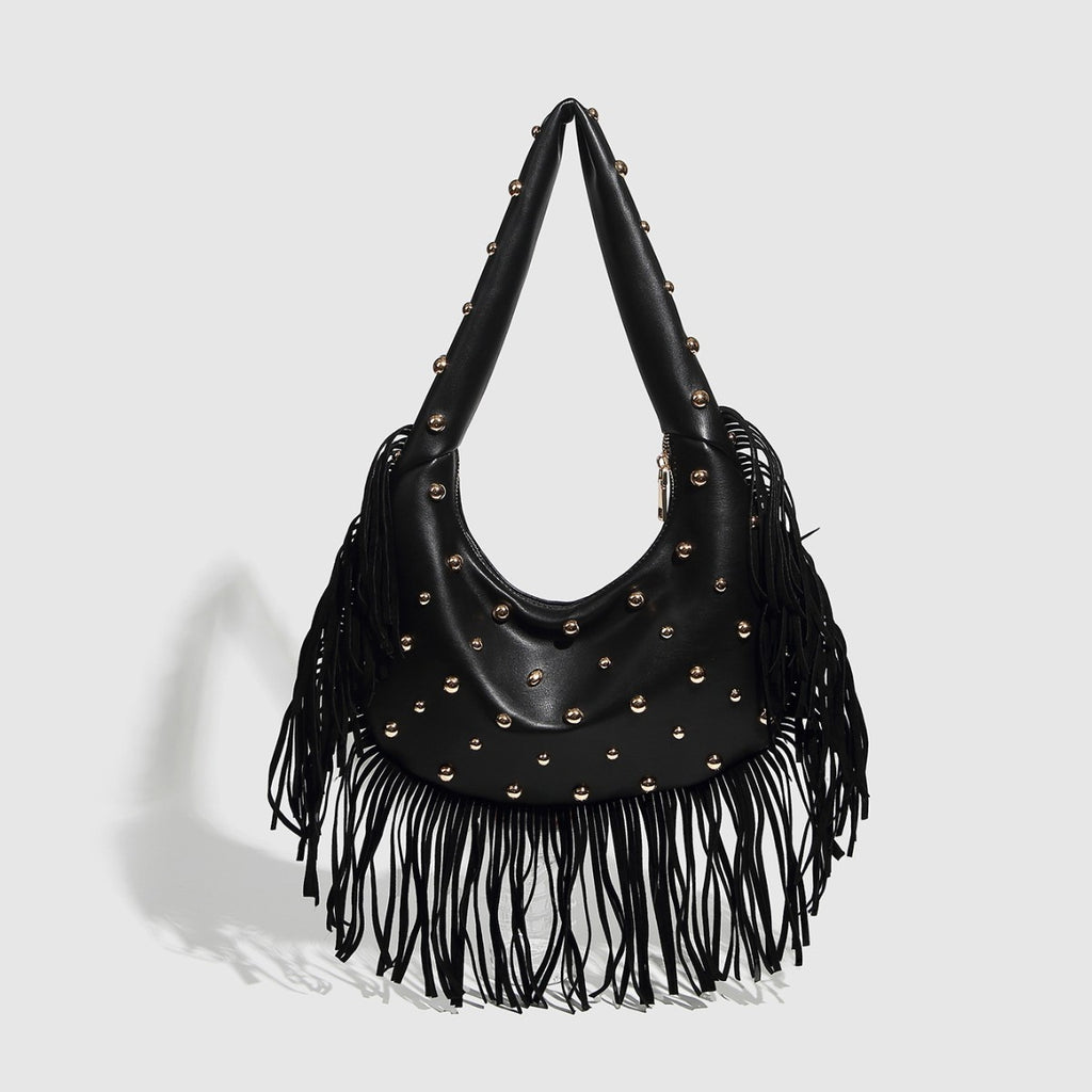 Bolso de hombro con flecos y tachuelas