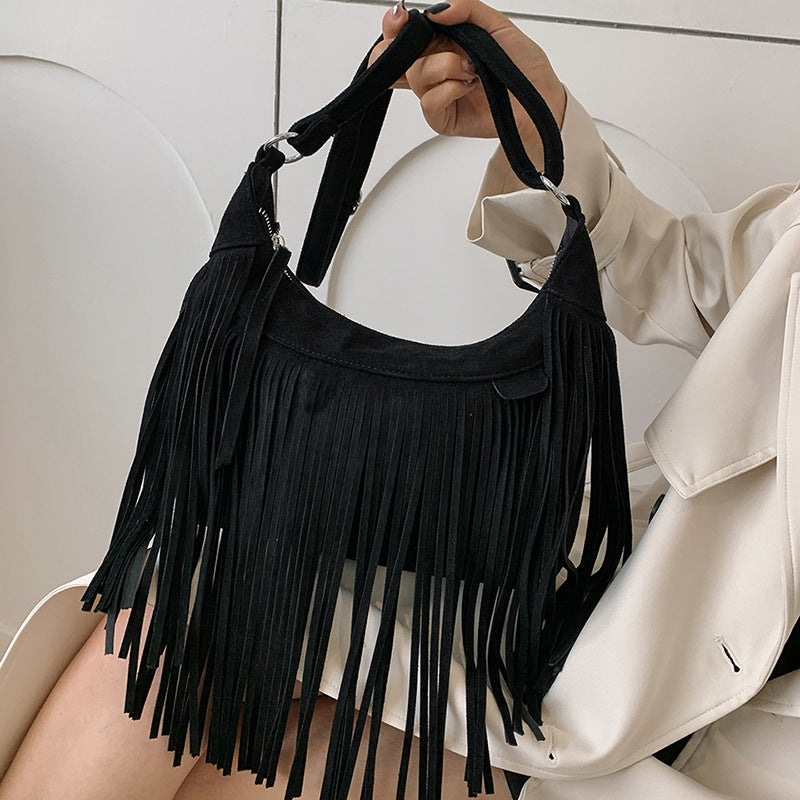 Bolso bandolera con flecos