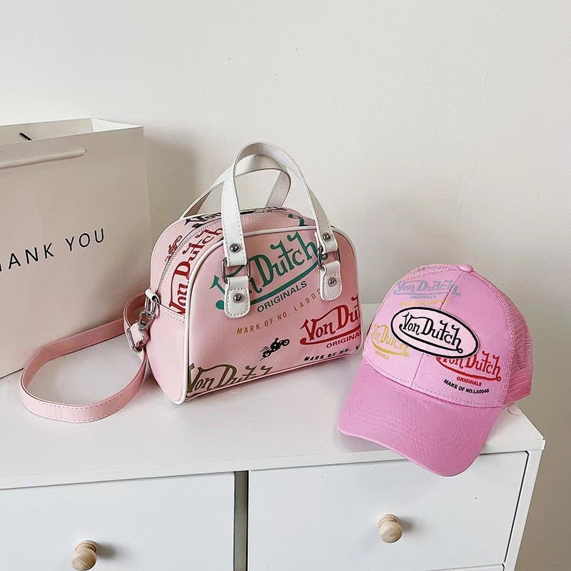 Bolso de mano y bandolera con grafiti Von Dutch