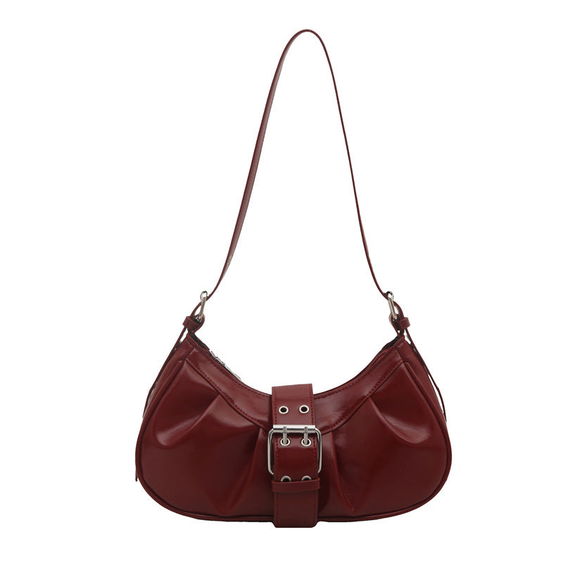 Bolso de hombro pequeño con correa y textura brillante