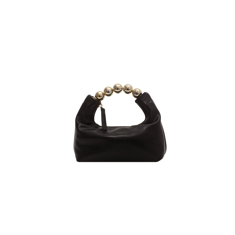 Bolso de mano con agarradero de perlas - bandolero