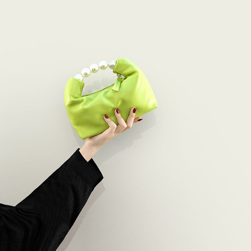 Bolso de mano con agarradero de perlas - bandolero